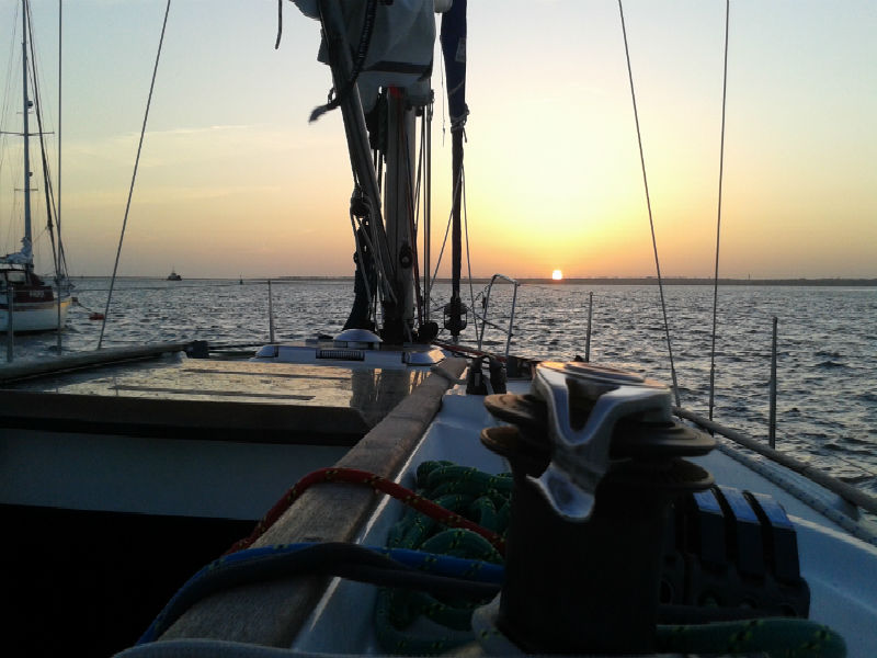 Photo of Nomad 1 Jeanneau Sunfast 37 sailing towards a sunset
